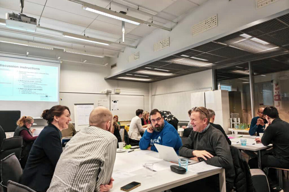 People discussing at the Bootcamp event