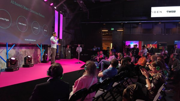 Person pitching at a startup event.