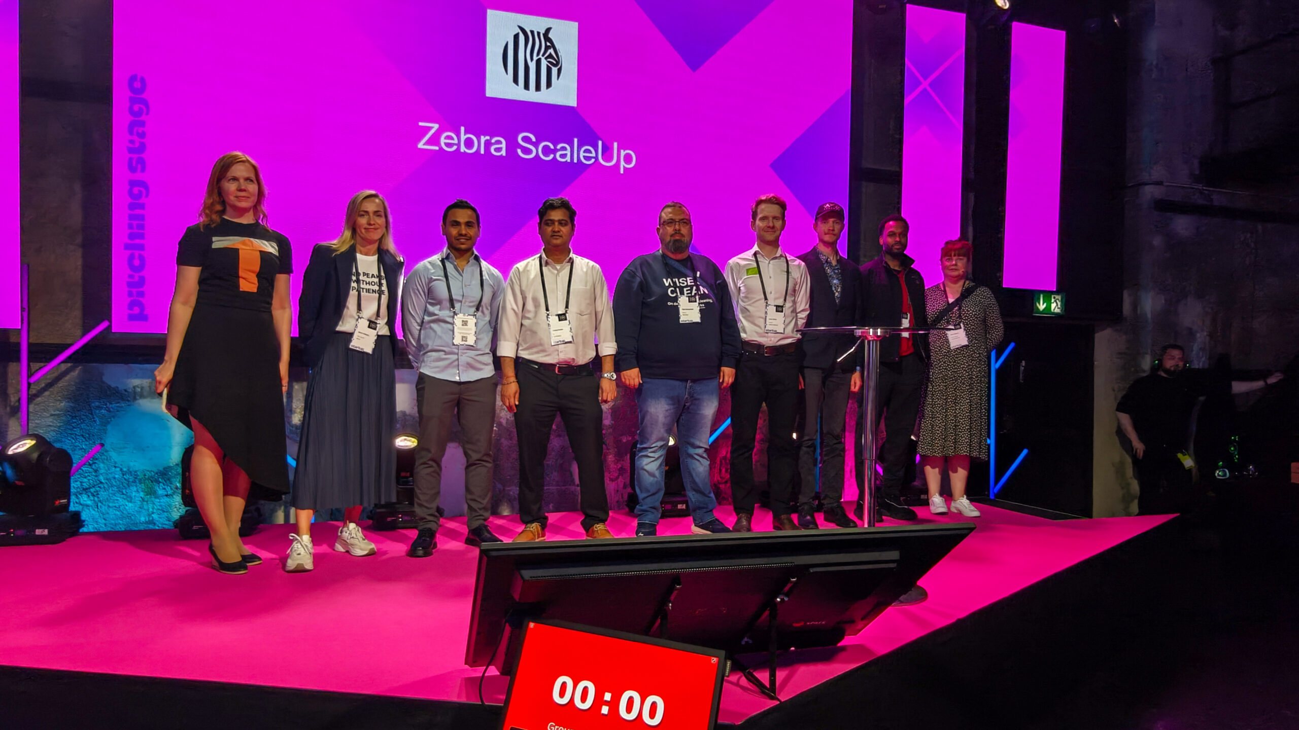 Zebra ScaleUp cohort at the Latitude59 event stage.